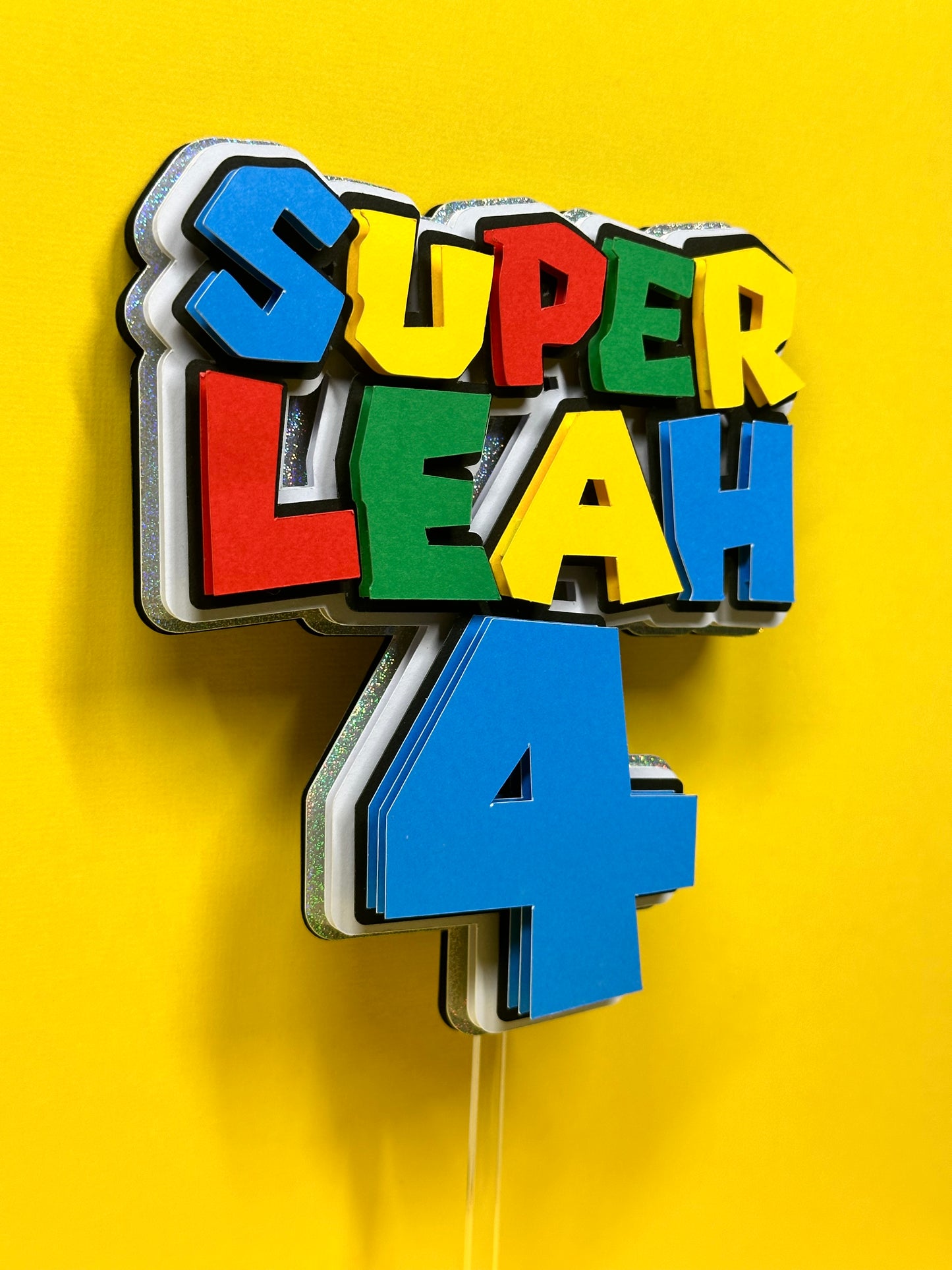 Super Mario Bros Logo Inspired Cake Topper